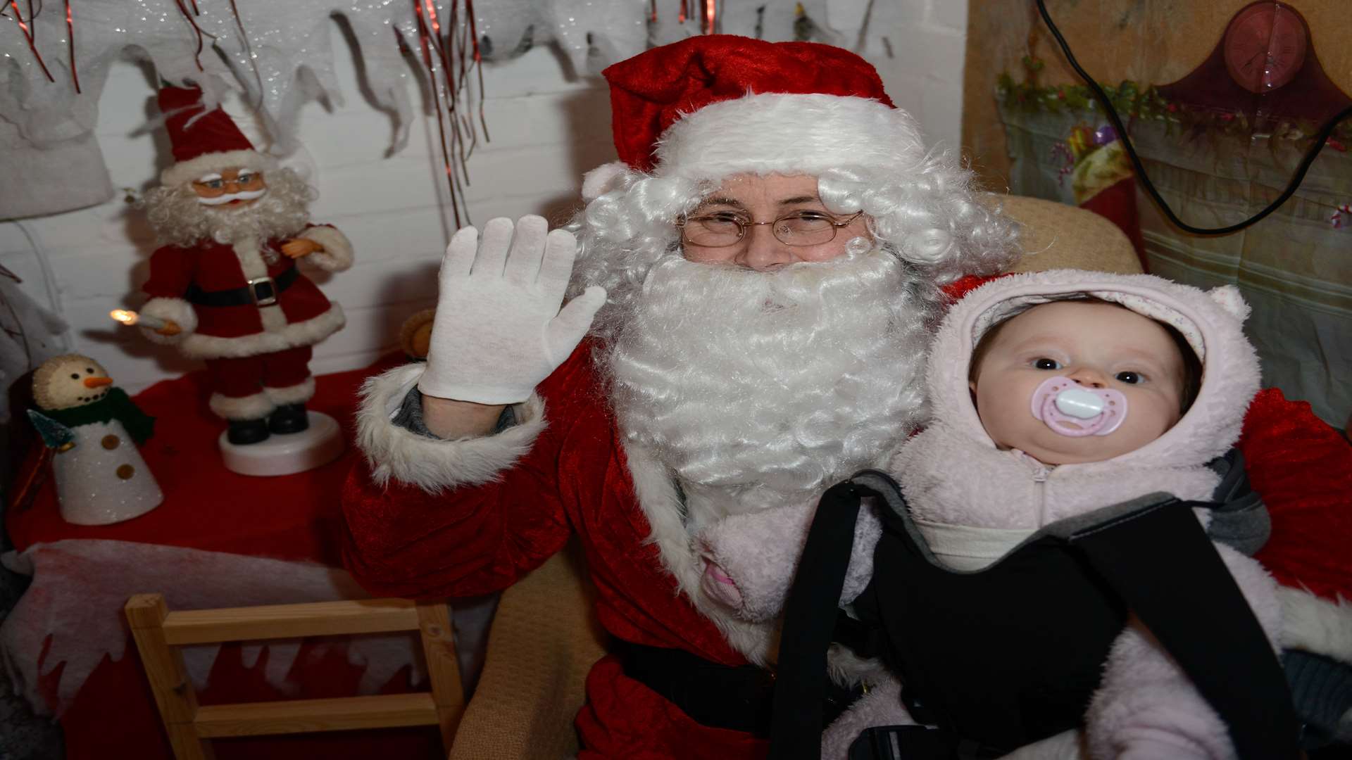Santa Lee Curry with Gracie Curry, seven-months-old, who the event was in aid of