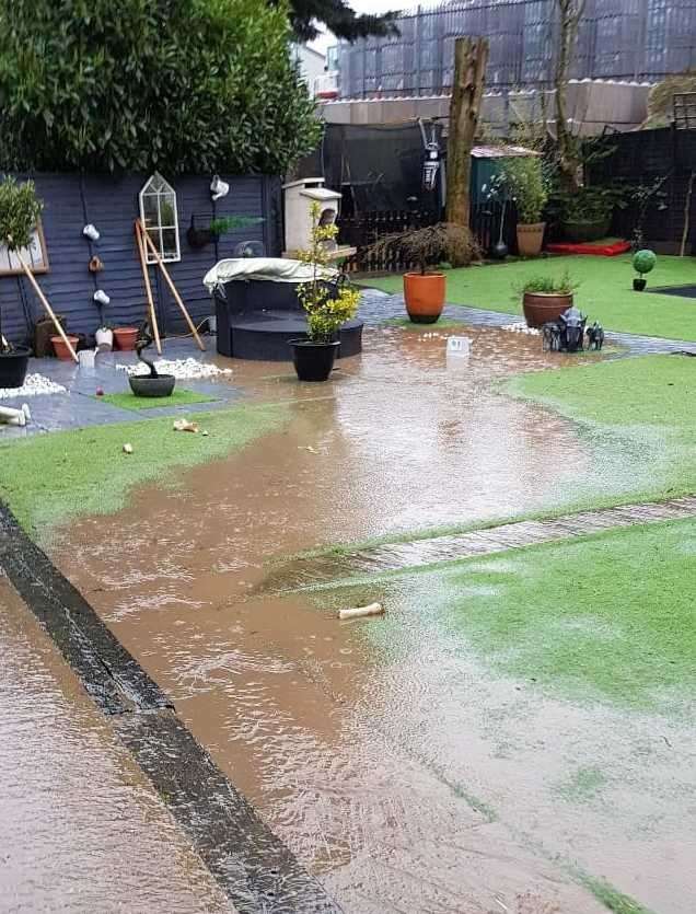 Mrs Dent says her garden has been ruined by water damage