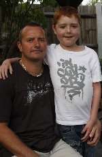 Nine- year-old Keller Williams with his dad Ricki.