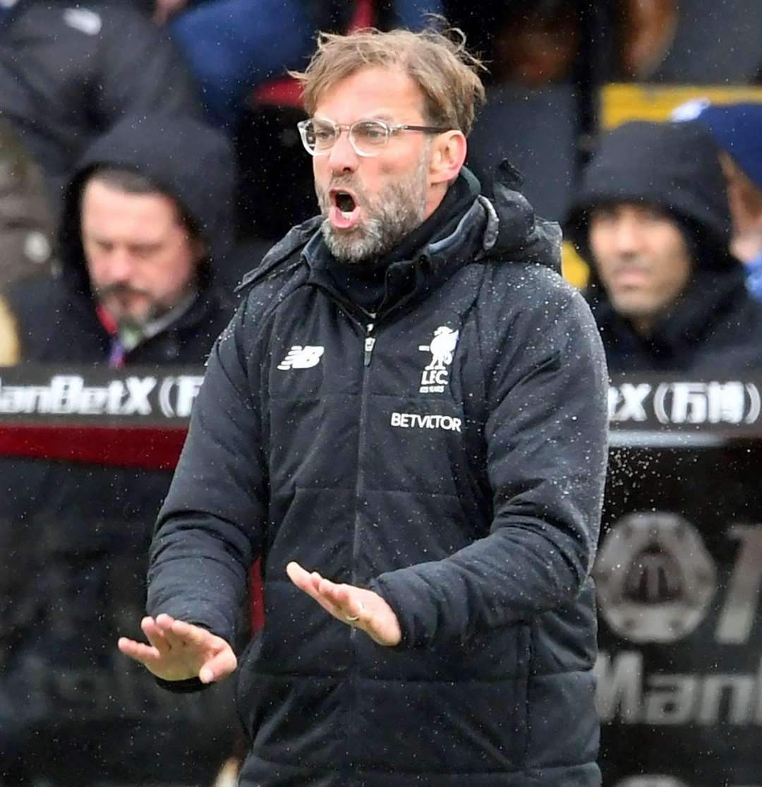 Jurgen Klopp led Liverpool to the Premier League title in 2019/20, while Daniel Farke has won the Championship twice with Norwich. Picture: Keith Gillard
