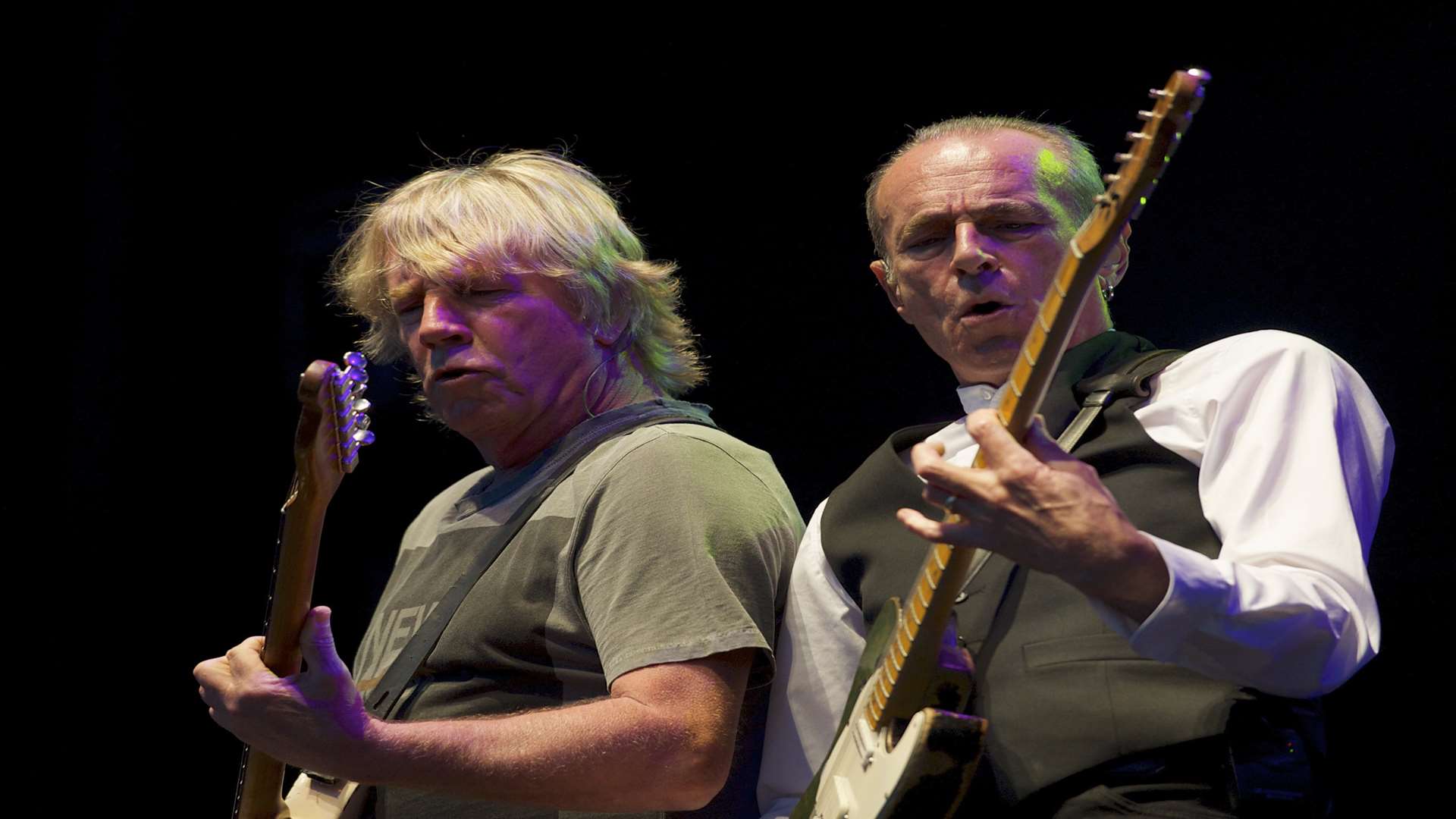 Rick Parfitt, left, and Francis Rossi. Status Quo play the first night at the Rochester Castle Concerts 2013