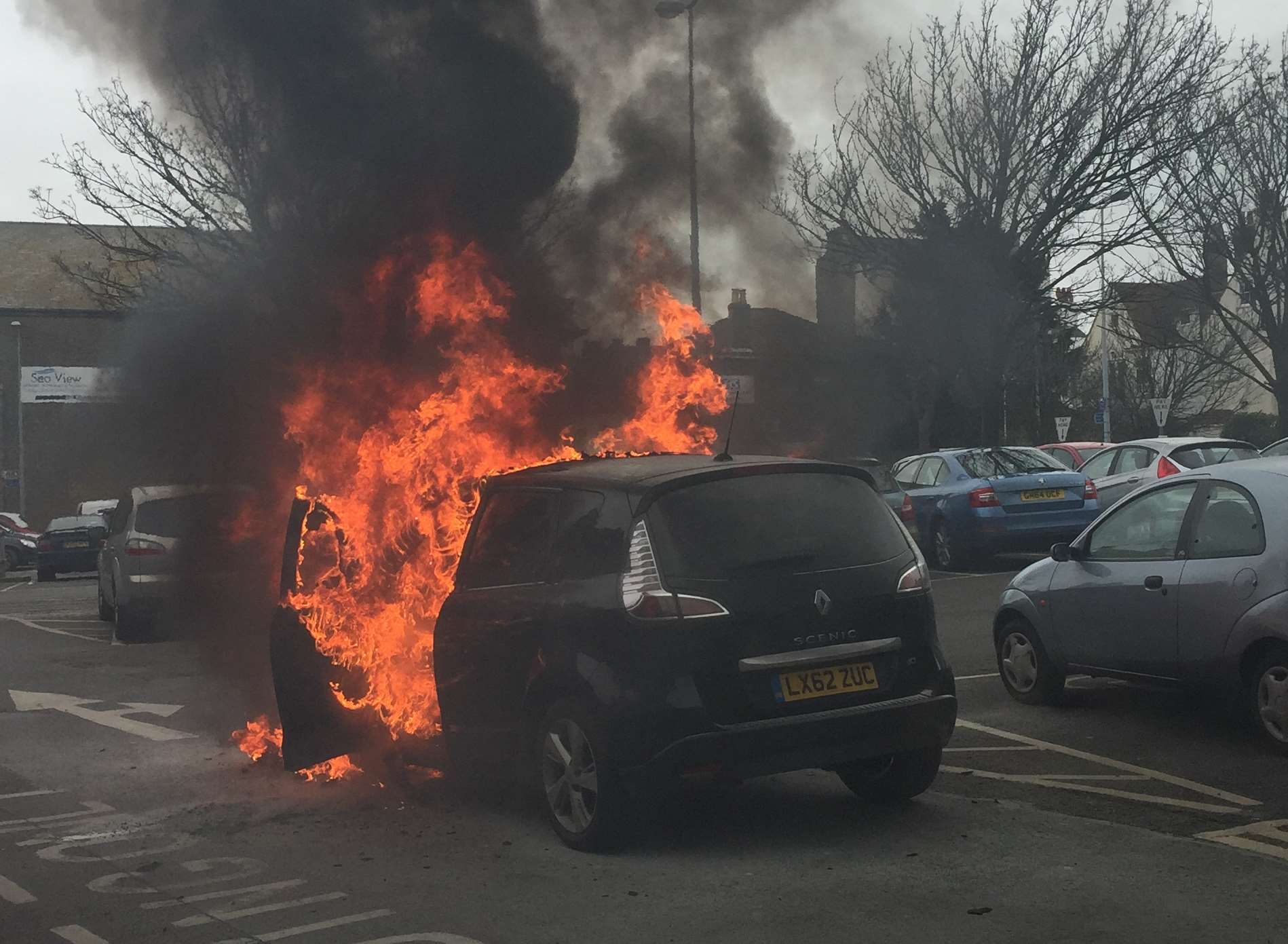 The car was engulfed in flames