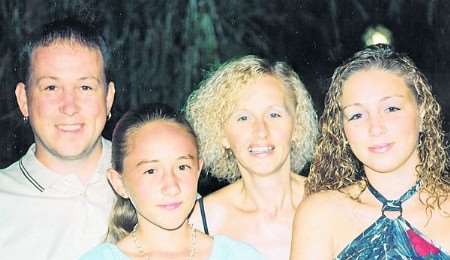 Happier times: Steve and Jenny Whiting with daughters Stacey and Charlotte taken on holiday six years ago.