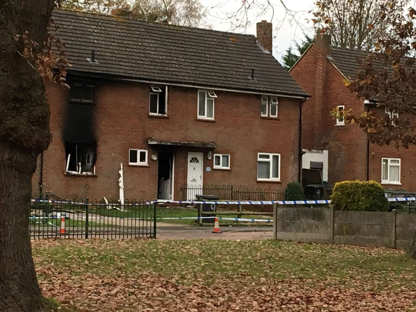 The burnt home is still cordoned off by police