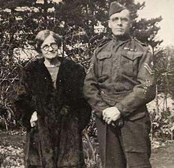 Jack Peters, who took the cap, in his Home Guard uniform with his wife Alice