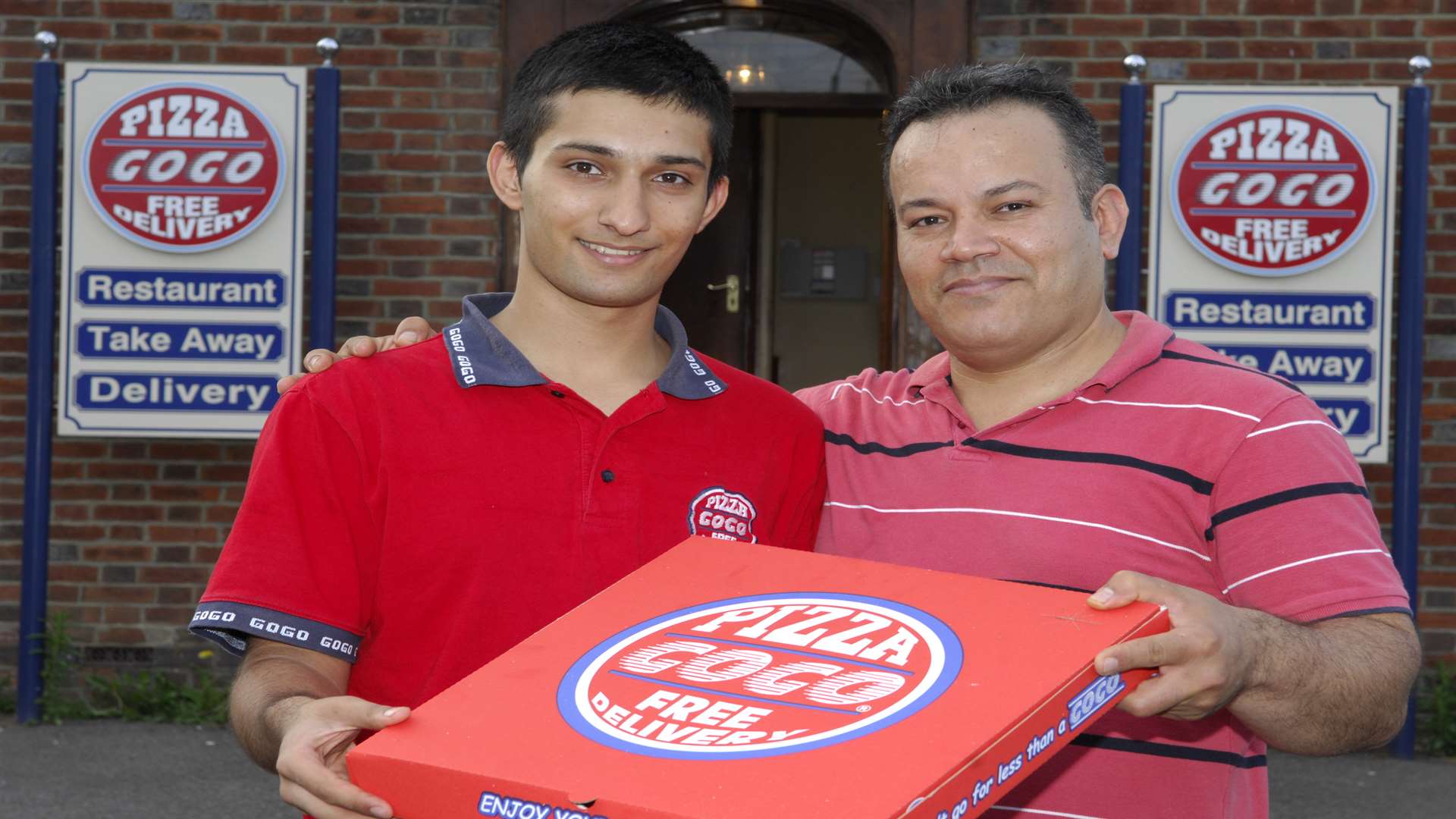Mohammad Gholami and his father, franchisee Mansour Gholami