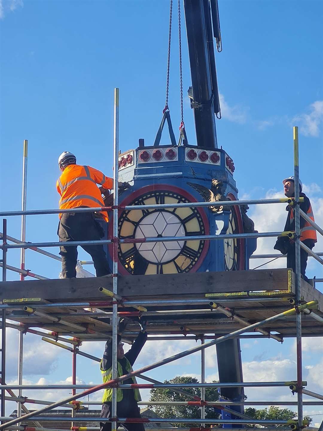 Day One: The roof, bell and 'clock box' of the 119-year-old Sheerness clock tower is removed by Smith of Derby engineers. It will be taken away to be restored. Picture: Donna Mansi