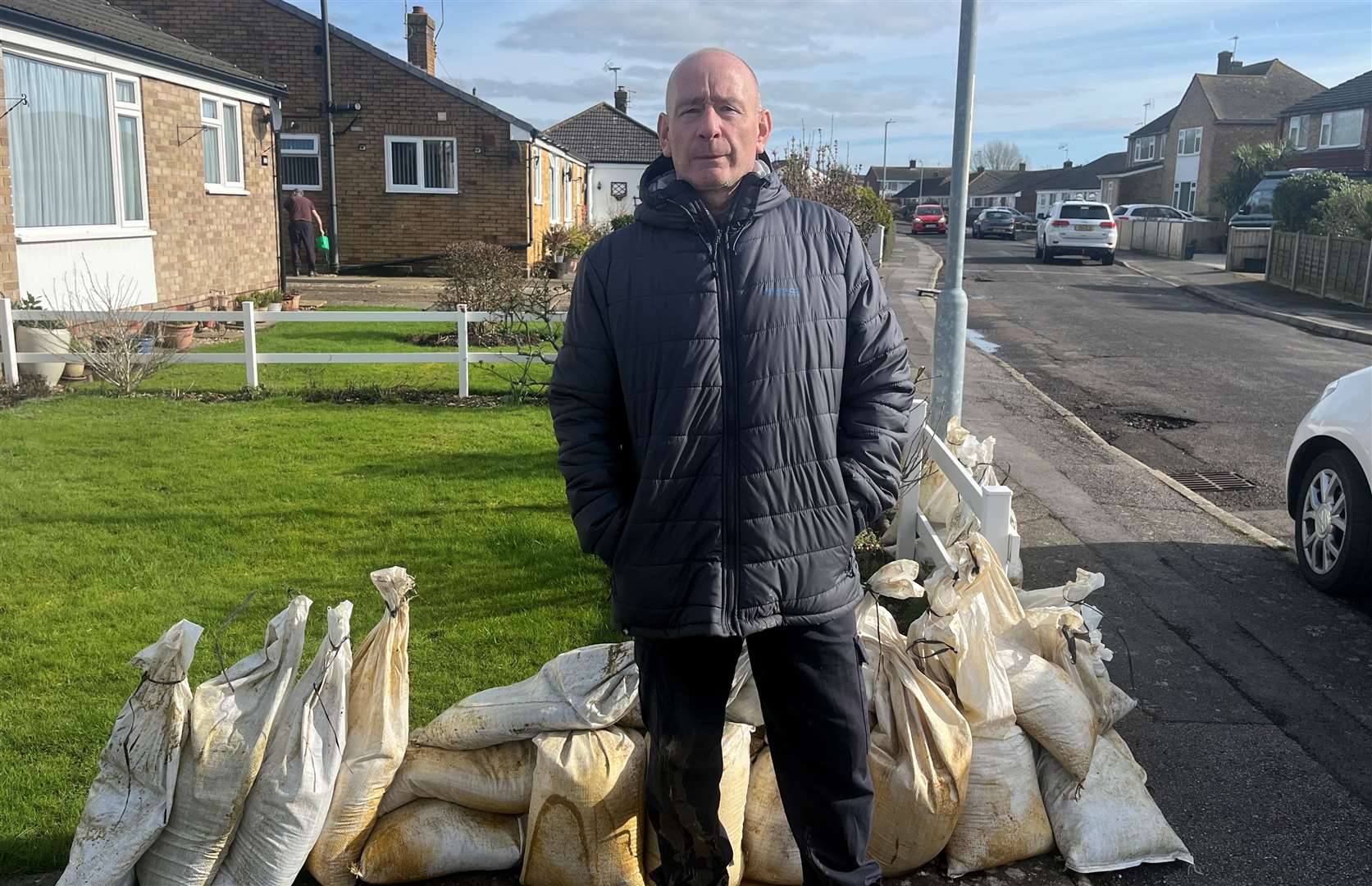 Marlon Harman, 59, with the sandbags he received from Folkestone and Hythe District Council