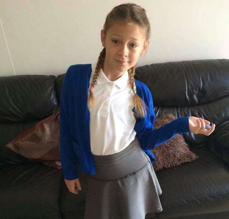 Ashley all ready for school in her girls uniform