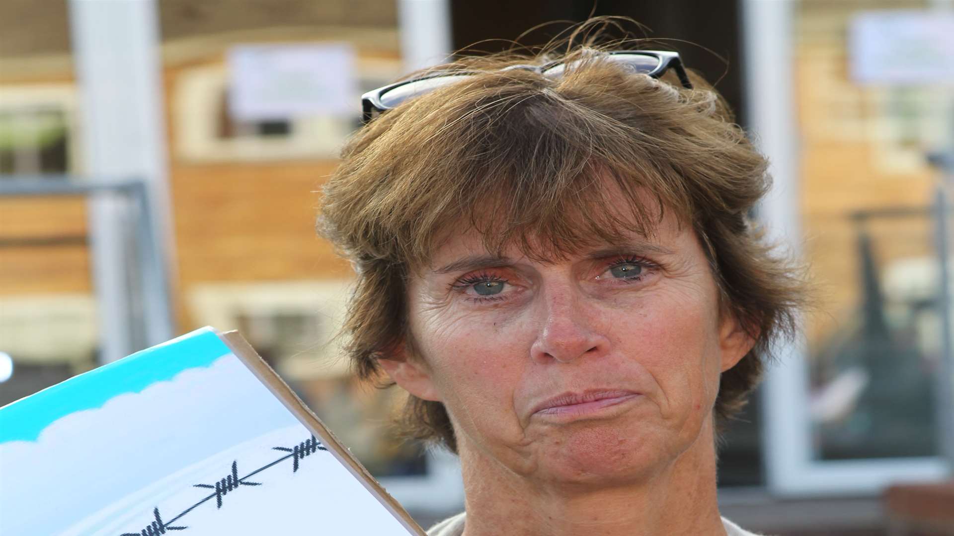 Wendy Writer, a protester outside a public exhibition for a large free range chicken farm proposal at Horsmonden Village Hall