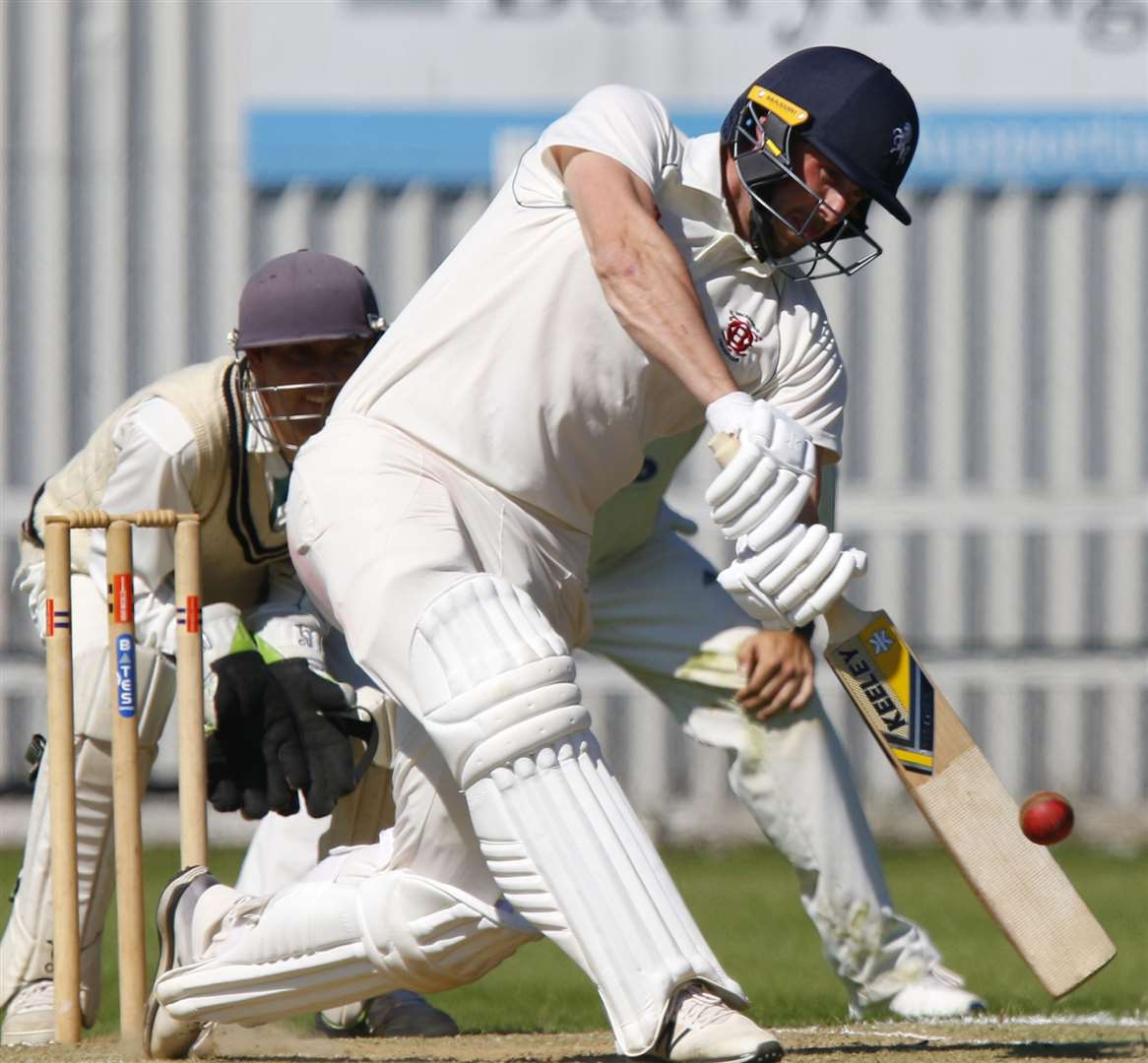 Beckenham's Alex Blake hits a six to seal victory against Lordswood. Picture: Andy Jones