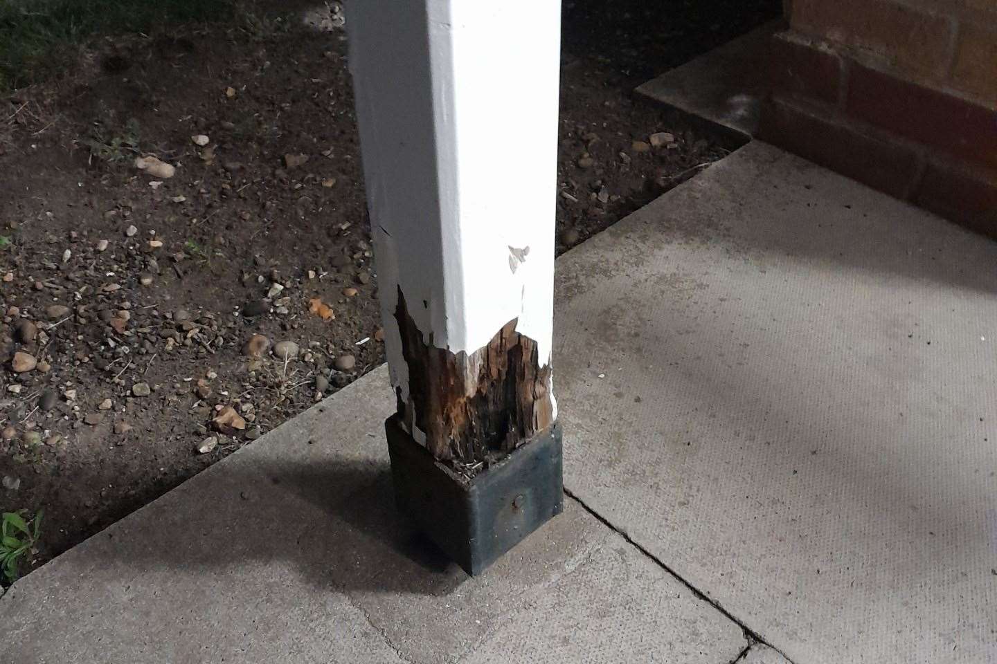 The post at the entrance has been left to rot