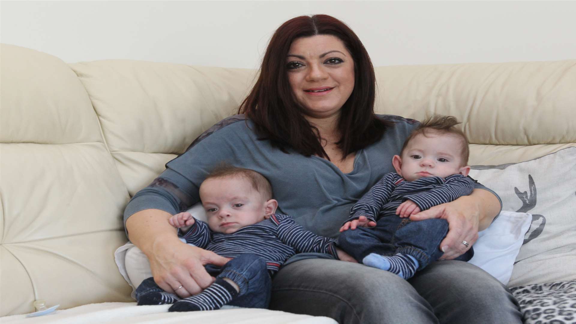 Michelle Green with two of her premature triplets, from left, Samuel and Bailey, both nine months old. There other brother, Aaron is still in hospital. Picture: John Westhrop.