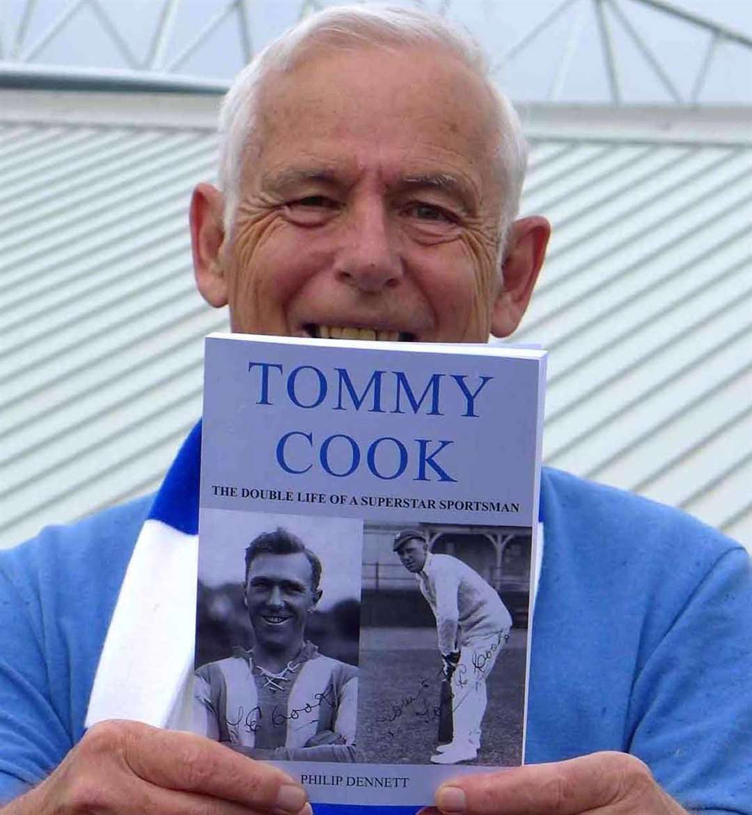 Author Phil Dennett with his book, “Tommy Cook, The Double Life of a Superstar Sportsman”