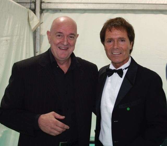 Phil with Sir Cliff Richard decades after their first chance encounter