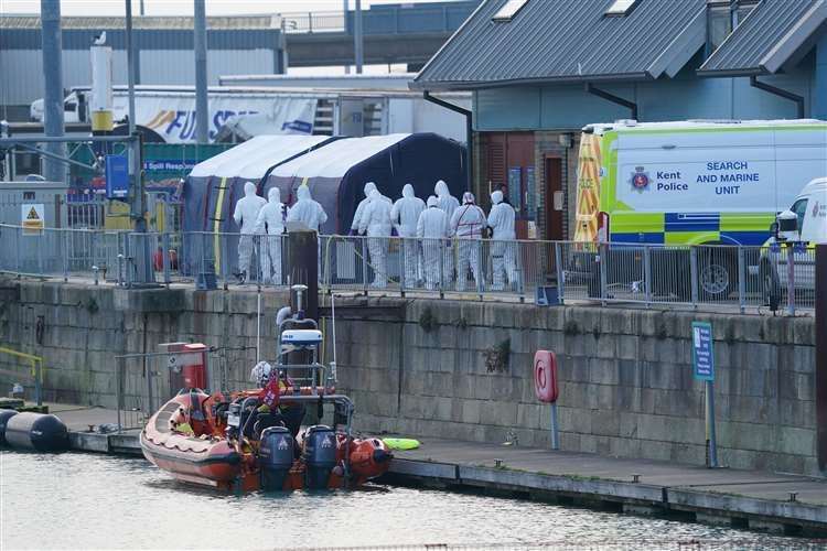 Emergency services at the RNLI station at the Port of Dover after four people died when a migrant boat capsized in the Channel during another incident. Picture: Gareth Fuller/PA