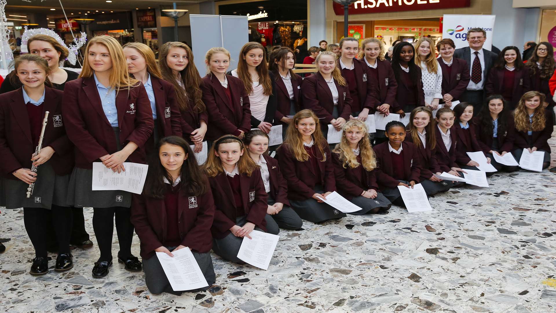 Members of the Invicta Grammar School choir joined the West Kent Befriending Service and Maidstone Rock Choir. Picture: Martin Apps