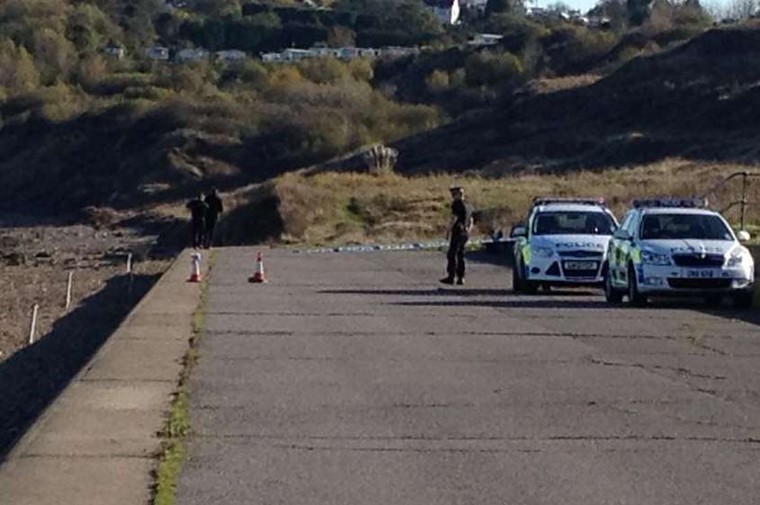 Police at the spot where the body of Lewis O’Neill-Smith was found on Minster Beach