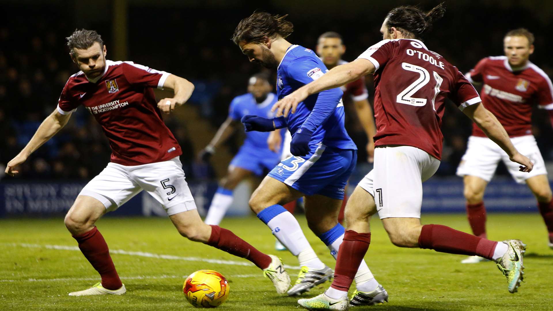 Two against one for Bradley Dack Picture: Andy Jones