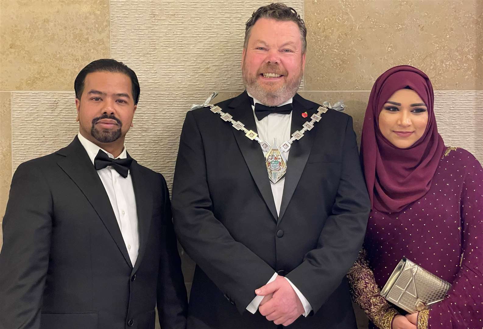 Owner Ash Miah with wife Sume and mayor Callum Knowles