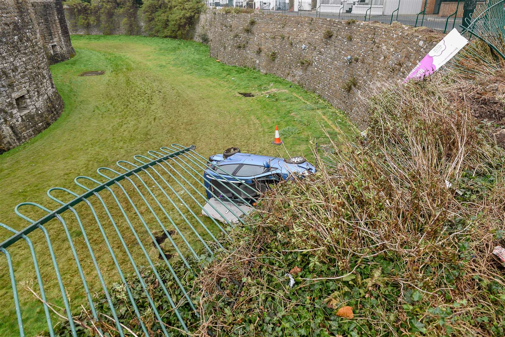 It was the second car this year to veer off the road into the moat