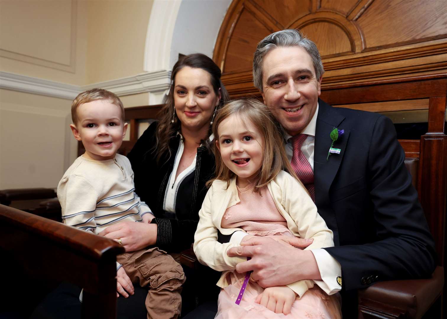 Simon Harris with his wife Caoimhe and children Cillian and Saoirse (Maxwell Photography/PA)