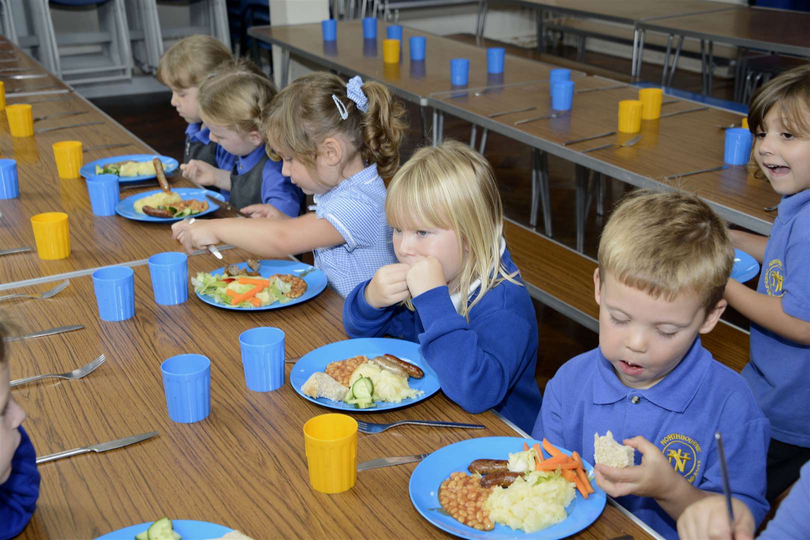 Young connoisseurs tuck in to a Whole School Meals lunch as the CIC celebrates 10 years of serving school dinners