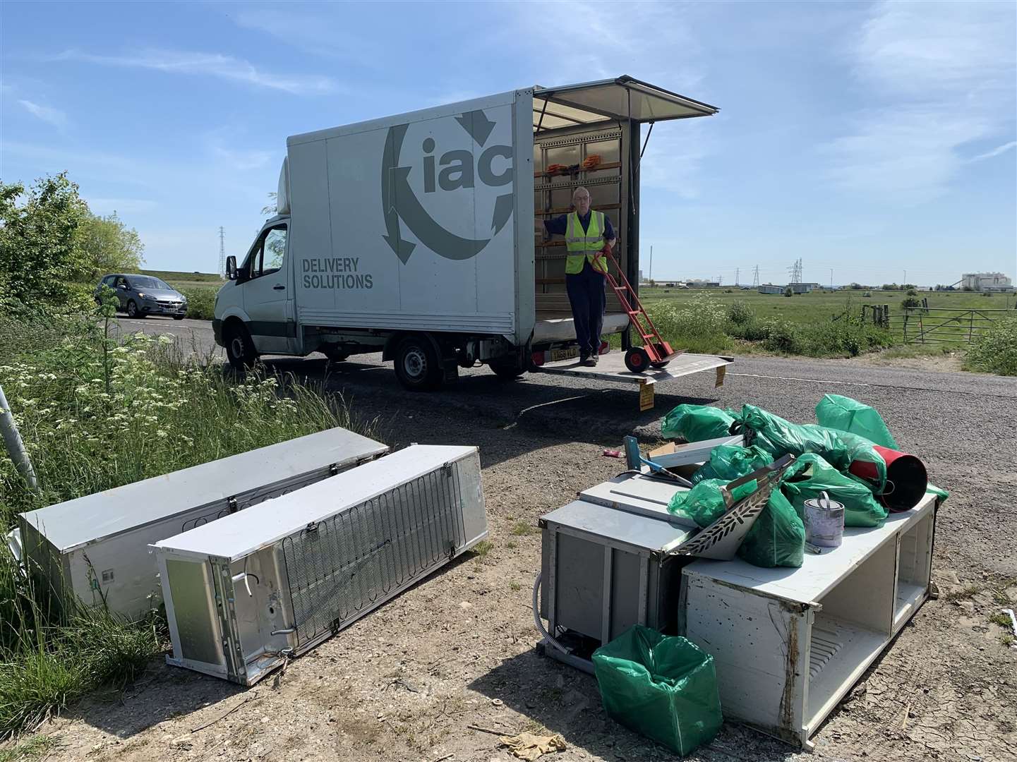 Eyesore: fridges fly-tipped at Iwade. Sittingbourne company IAC Delivery Solutions has collected them free of charge. Picture: IAC