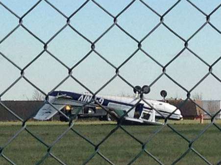 A plan left upside down after a crash at Rochester Airport
