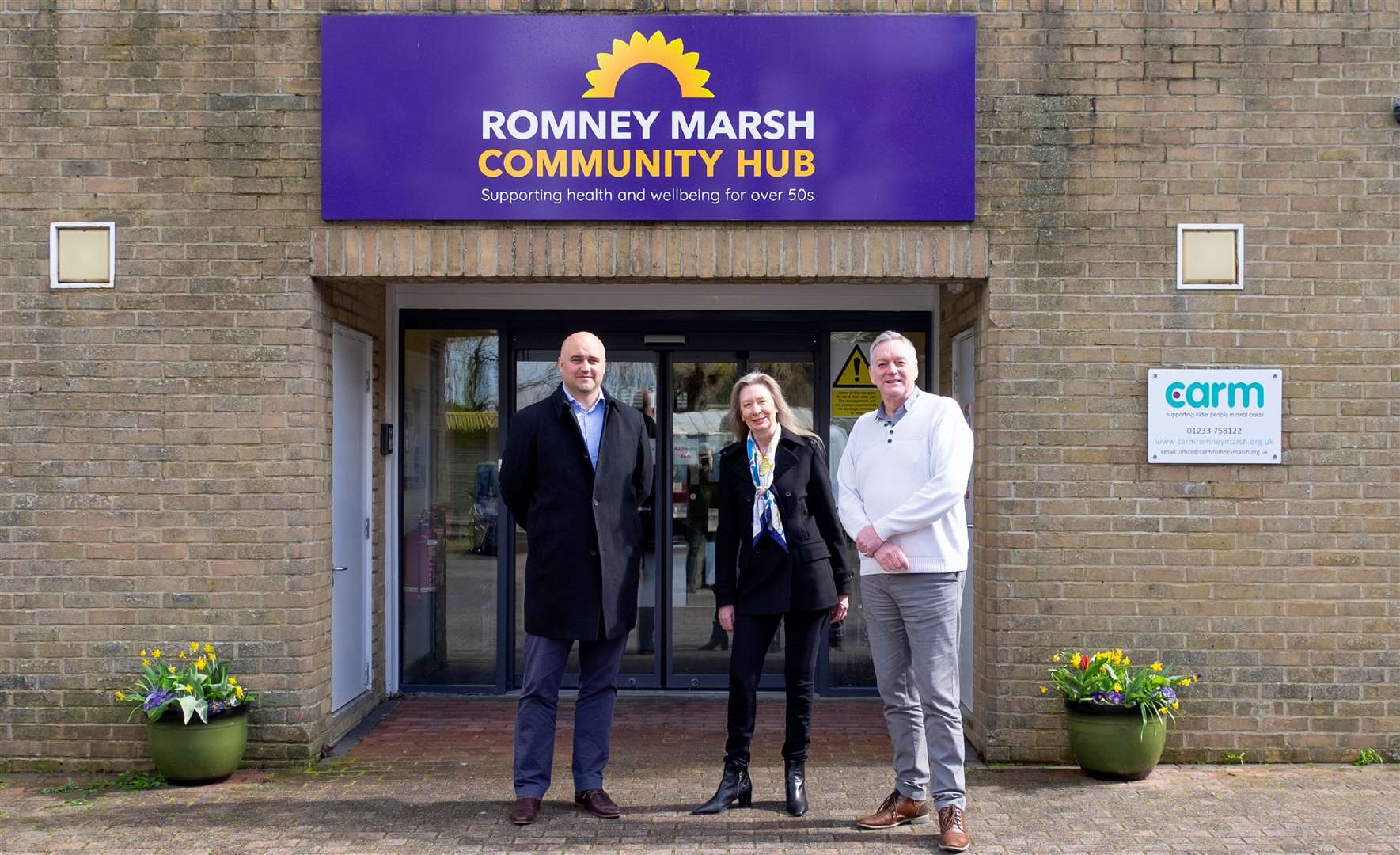 Paul Kitchingman, Councillor Patricia Rolfe and Derek Ruby outside the Romney Marsh Community Hub