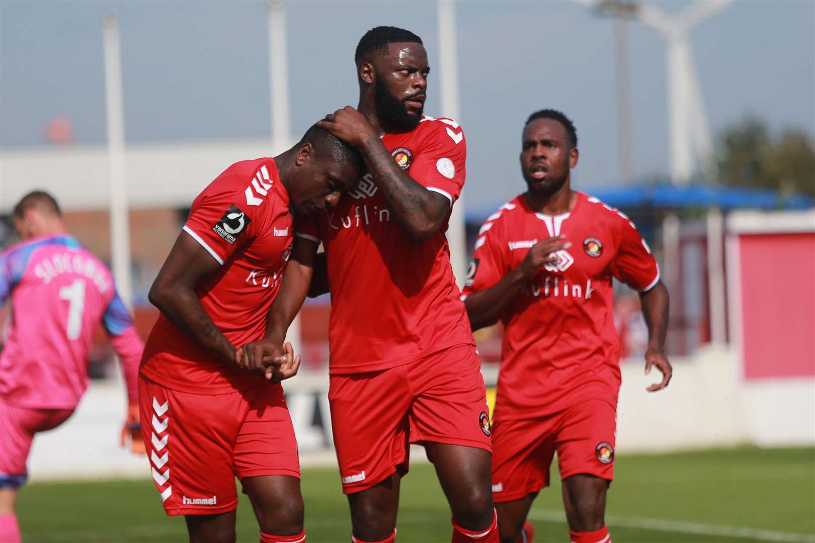 From left, Josh Umerah gets congratulated by Bondz N'Gala for Ebbsfleet in red, after scoring against Notts County, at Ebbsfleet United Football Ground. Picture: John Westhrop.. (15699758)
