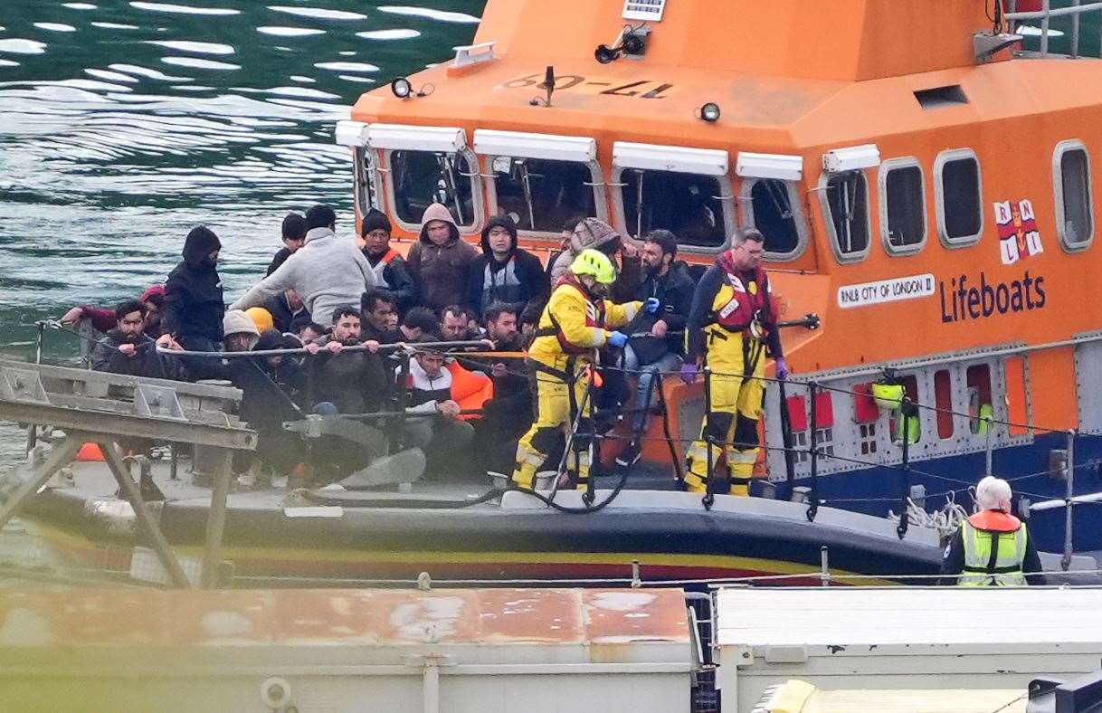 A group of people thought to be migrants are brought in to Dover, Kent, on board the RNLI Dover Lifeboat (Gareth Fuller/PA)