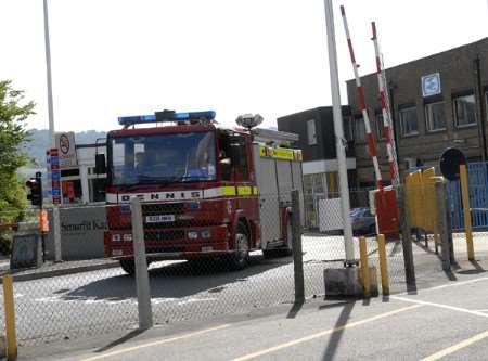 A fire engine leaves the scene of the blaze on Friday. Picture: Barry Hollis