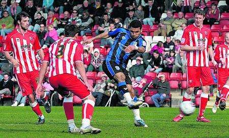 Andy Barcham sends in a shot.