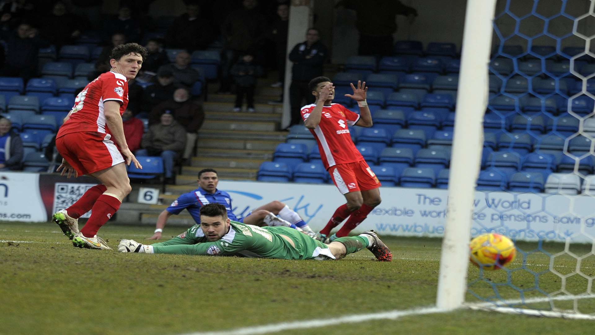 Bradley Garmston puts the Gills 3-2 ahead against MK Picture: Barry Goodwin
