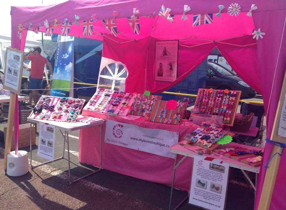 Jessica walls bows boutique stall to raise money for college funds.