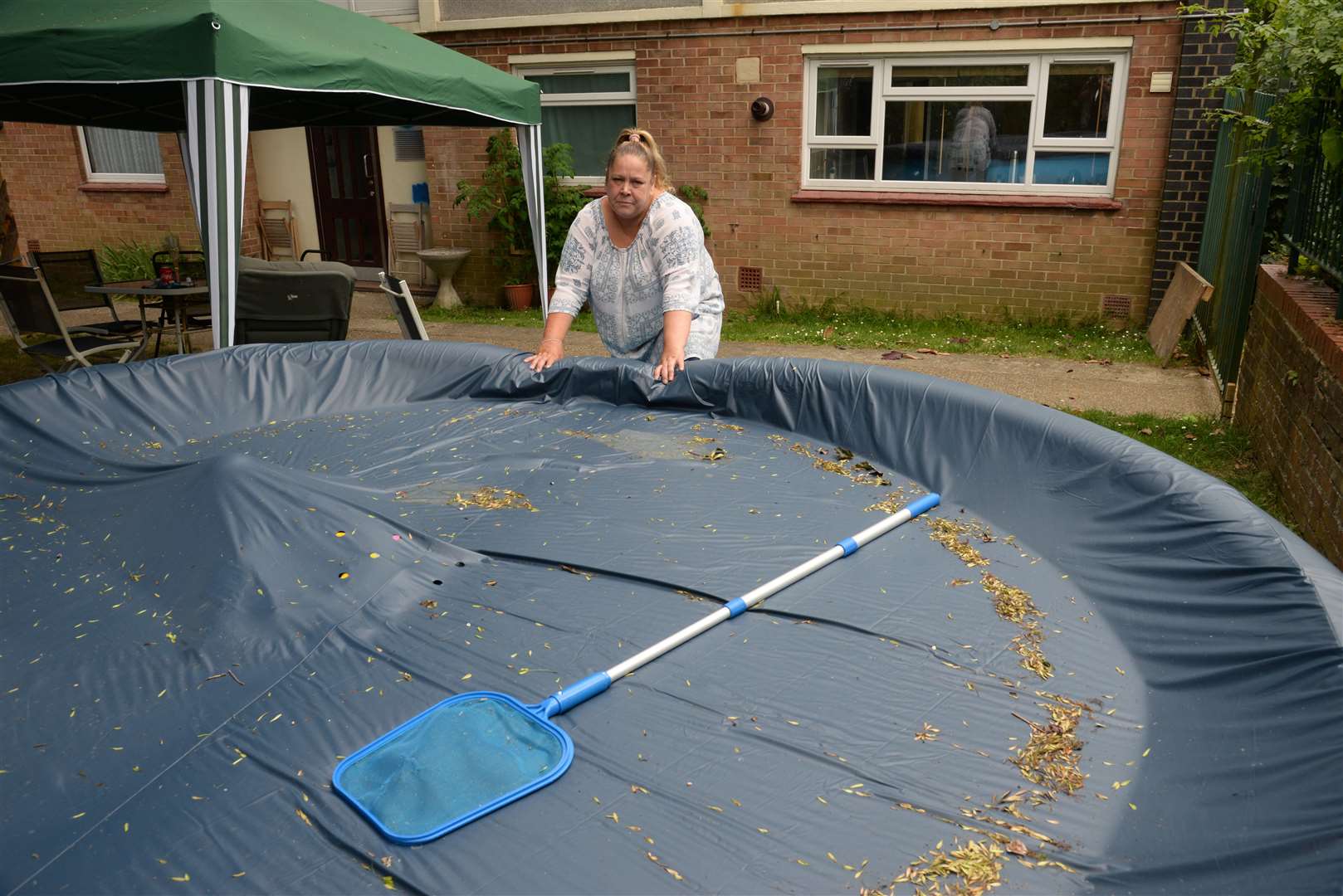Maria Young of Albatross Avenue who has been told to remove a paddling pool from the back garden