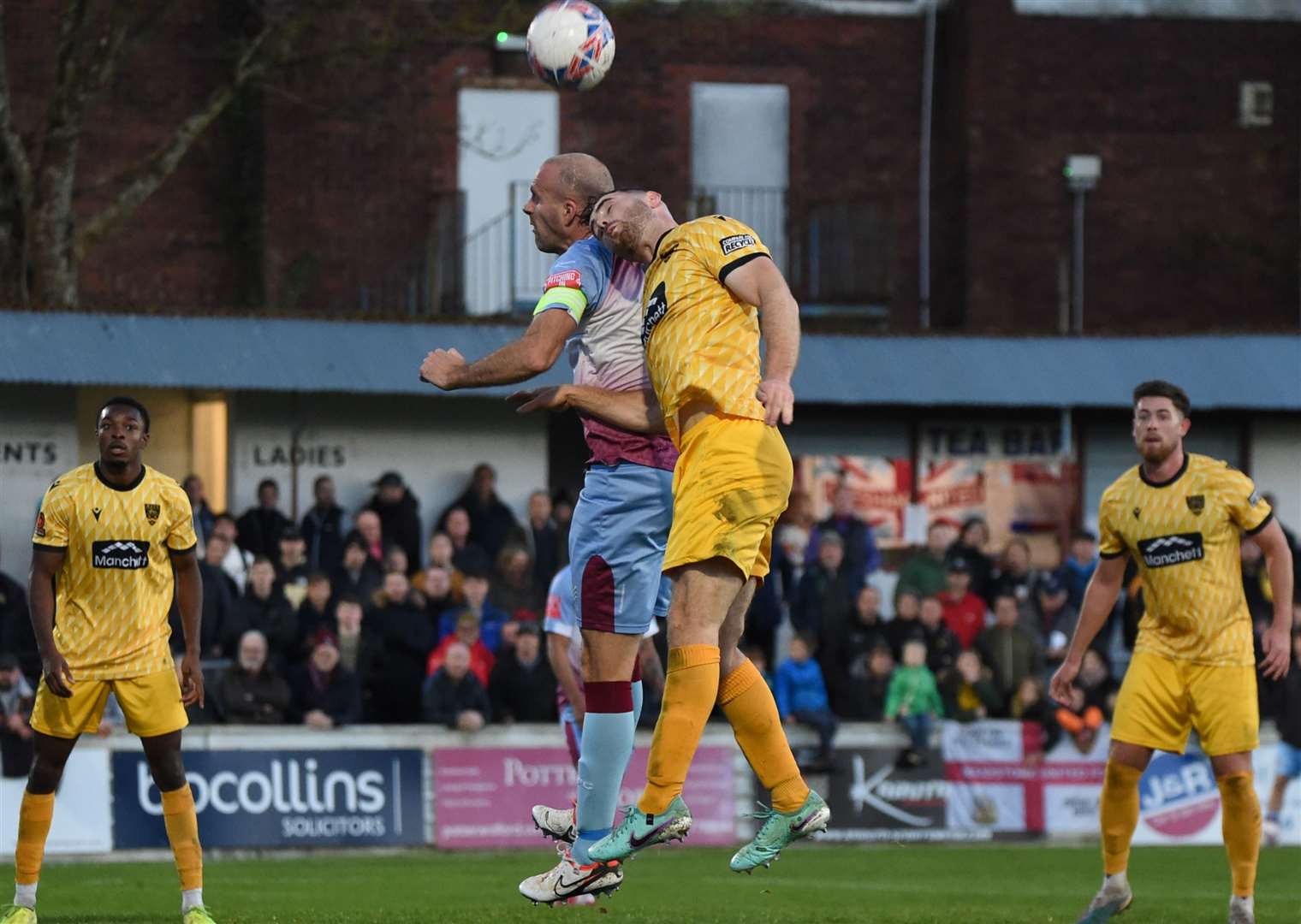 Chesham and Maidstone challenge in the air during their FA Cup First Round tie on Saturday. Picture: Steve Terrell
