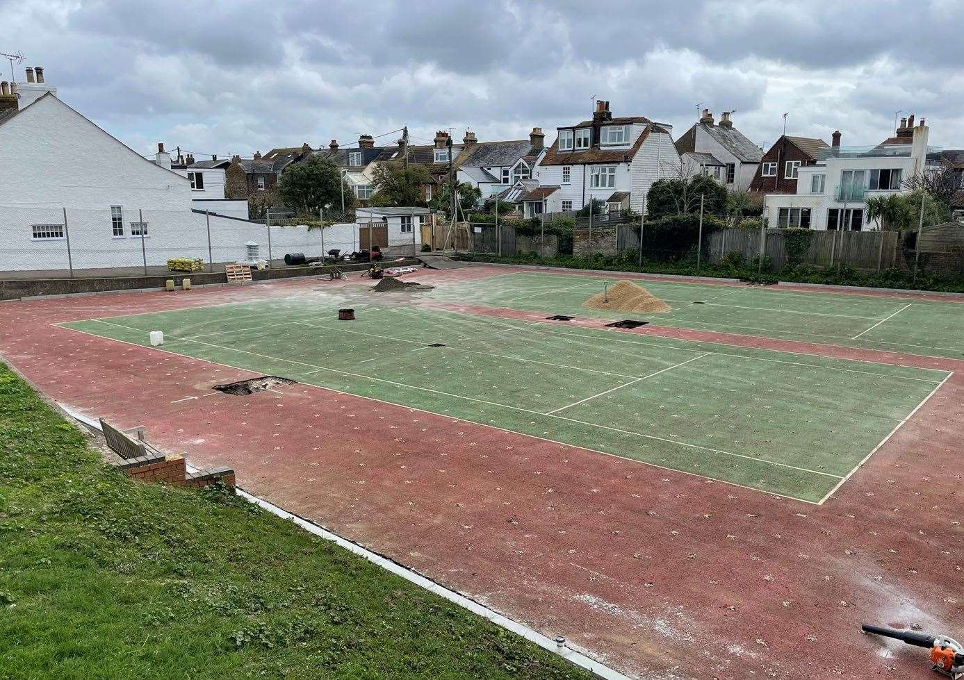 Work to refurbish and resurface the West Beach tennis courts in Whitstable is taking place in a joint project between the LTA and Canterbury City Council. Picture: Canterbury City Council