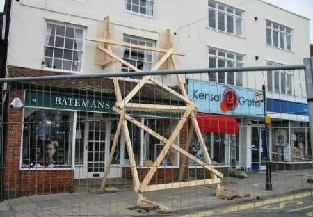 Emergency service spent several hours bracing the walls of Batemans Opticians to save it from collapse.