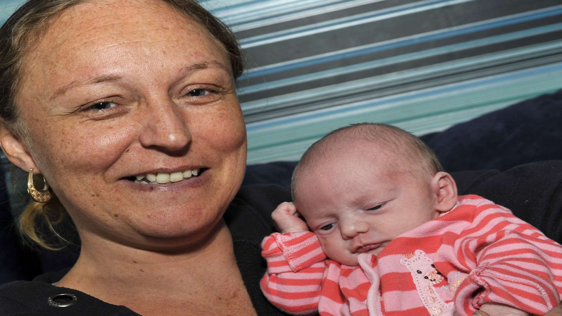 Mum Kelly Wicks with two-week-old Chalice