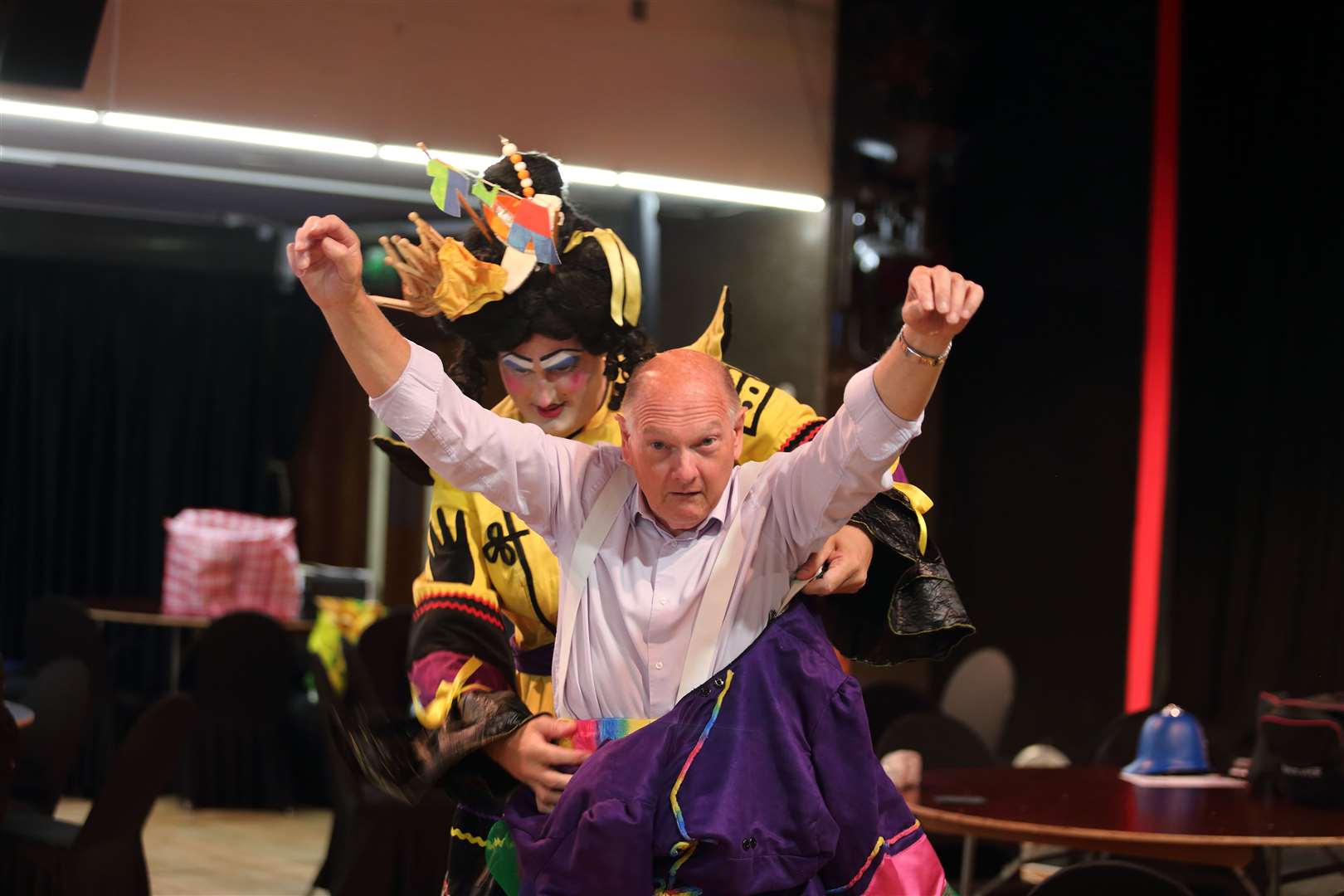 Step One: John Nurden tries out his frock for size thanks to Rob Cummings who plays Widow Twankey in Gravesend's panto Aladdin at The Woodville