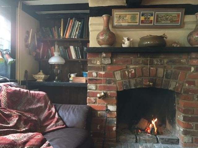 I found a perfect spot behind the main dining room in front of real fire number two
