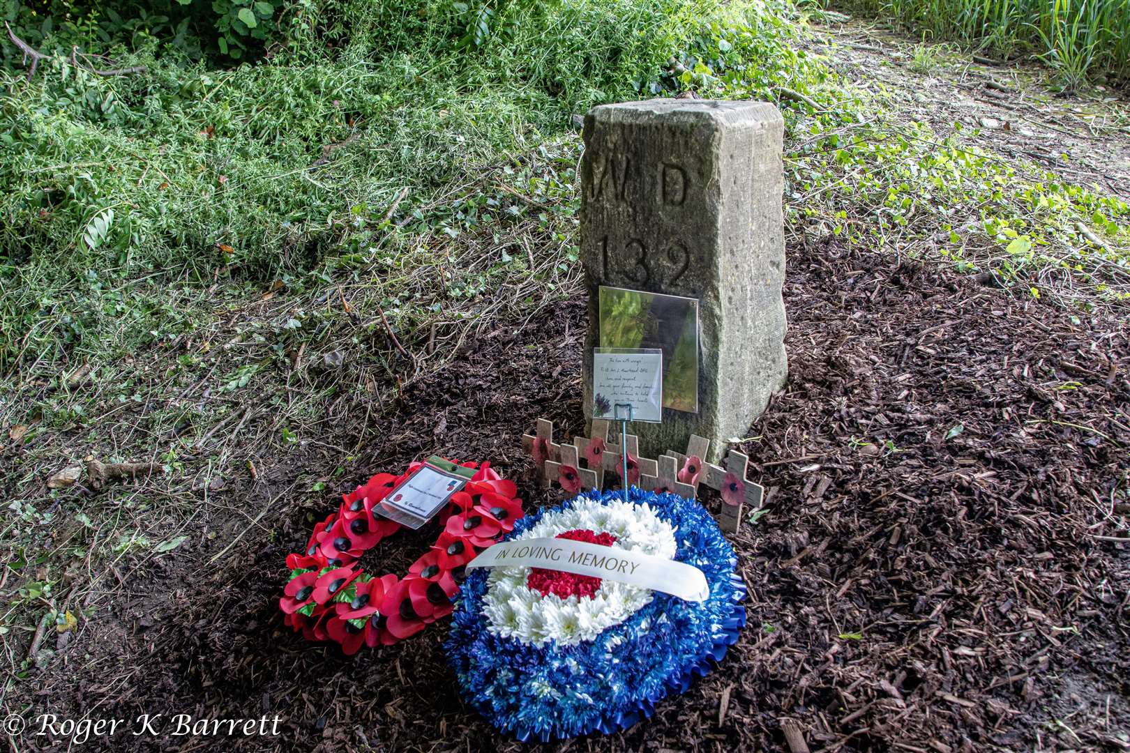 Tributes at the memorial to Ian Muirhead in the field in Hempstead, near Gillingham where the pilot crashed and died aged just 27. Picture: Roger Barrett