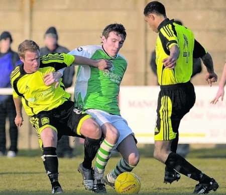 Action from Ashford Town's Division 1 South win over the Metropolitan Police. Picture: Dave Downey