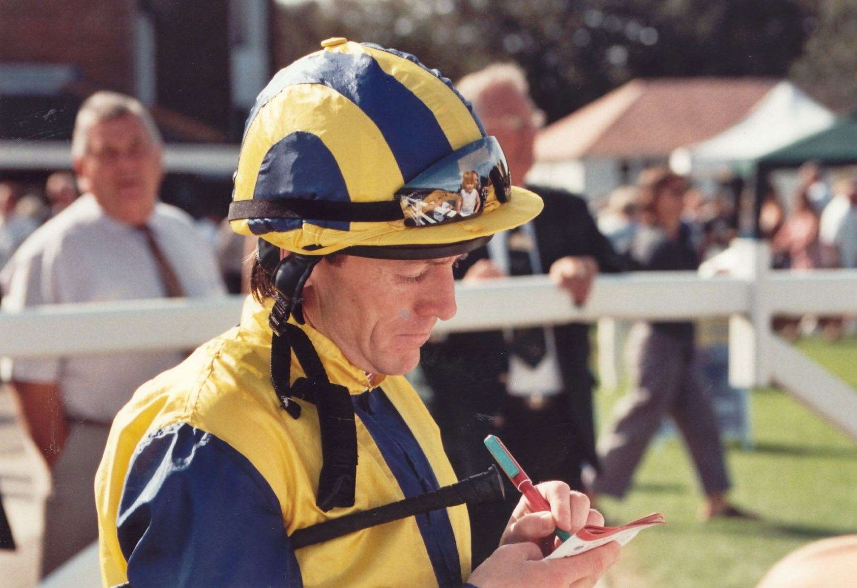 Champion jockey Kieren Fallon signs autographs during the first-ever Sunday meeting at Folkestone Racecourse in August 2004