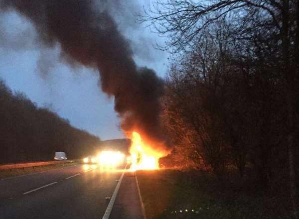 BMW MF52 in flames. Pic: Geoff Barden