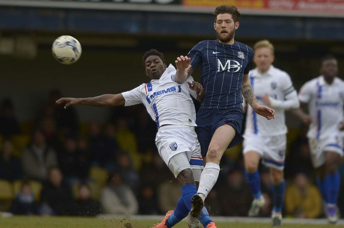 Jermaine McGlashan, in action for Gillingham, challenges for the ball against Southend Picture: Barry Goodwin
