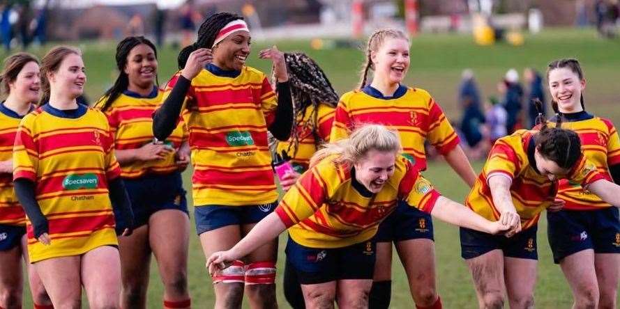Medway RFC under-18 girls’ captain Molly Errington leads the celebrations after their cup success. Picture: Face.It Visuals
