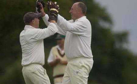 LIVELY LINTON: bowler Matt Large and wicketkeeper Craig Sands celebrate a wicket. Picture: BARRY CRAYFORD